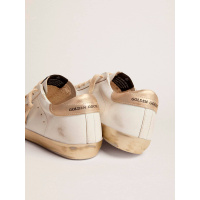 Golden Goose Super Star with gold sparkle foxing and metal stud lettering